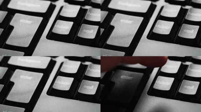 手指按下电脑上的删除选项。