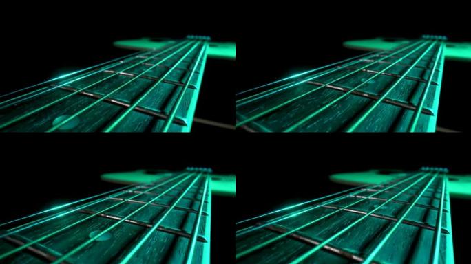 相机在绿色的灯光照射下，在黑色背景下，在古典原声吉他的指板上平移。棕色木制吉他琴颈，金属琴弦和琴弦极