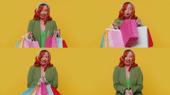 购物狂时尚年轻女子展示购物袋，假期广告折扣低价