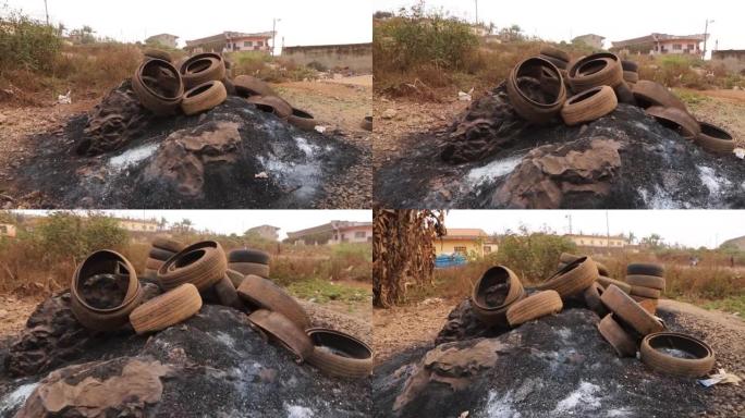 废旧汽车轮胎留在非洲的一个露天垃圾填埋场，随时可以燃烧、污染和医疗事故。