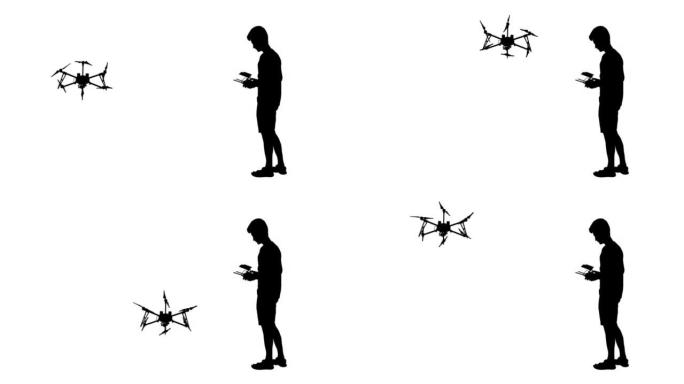 一名男子的黑色剪影操作无人驾驶四轴飞行器，动画。