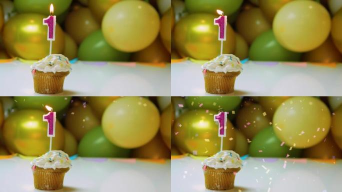1岁生日的喜庆背景，奶油纸杯蛋糕与燃烧的蜡烛和气球的背景。生日视频背景年龄