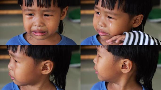 小男孩哭泣。