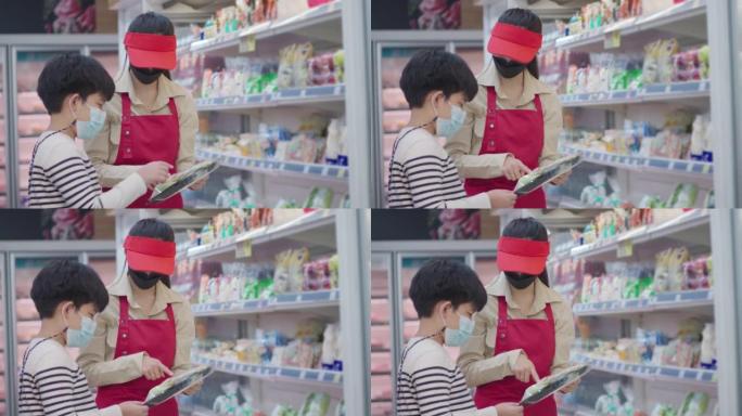 超市中的亚洲女性员工向顾客推荐