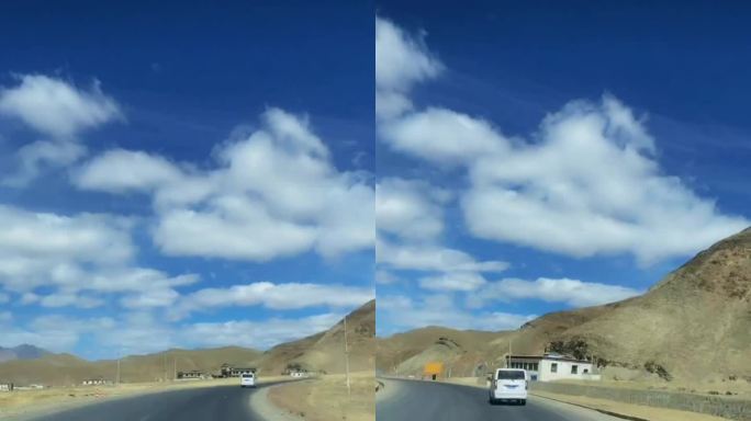 汽车旅行雪山风景蓝天白云视频素材