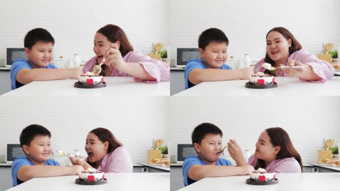 亚洲儿子和母亲在母亲节一起吃蛋糕