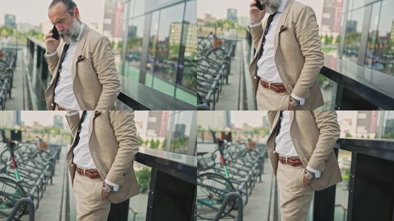 Mature businessman talking on the phone in busines