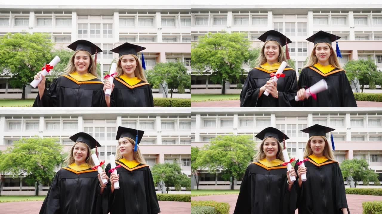 两名亚裔女学生在大学祝贺毕业典礼