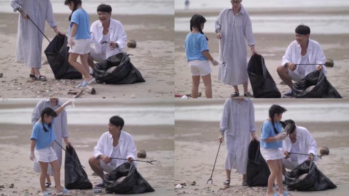 祖父，祖母和孙女在度假时在海滩上捡垃圾。
