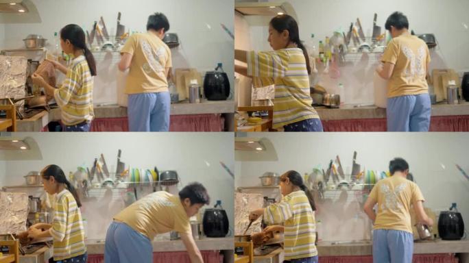 亚洲女孩在家厨房的炉子上做饭，周末生活方式的概念。