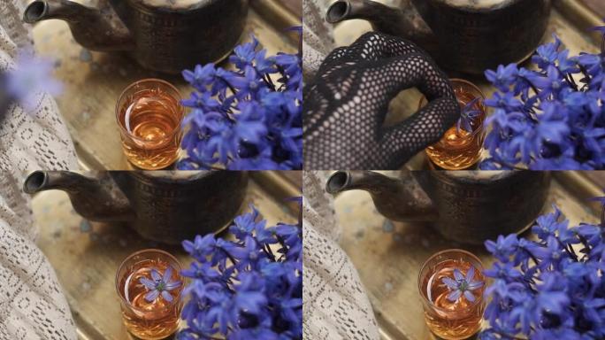 电影拍摄，蓝花复古静品画中的茶壶。顶视图