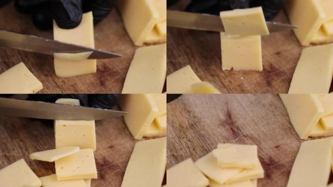 用大量牛奶切成小块的真正的硬奶酪