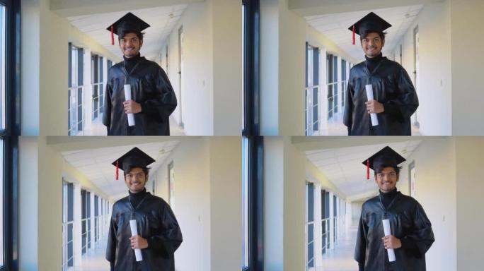 mantle的印度毕业生手里拿着文凭，微笑着。一个重要的事件。年轻专家