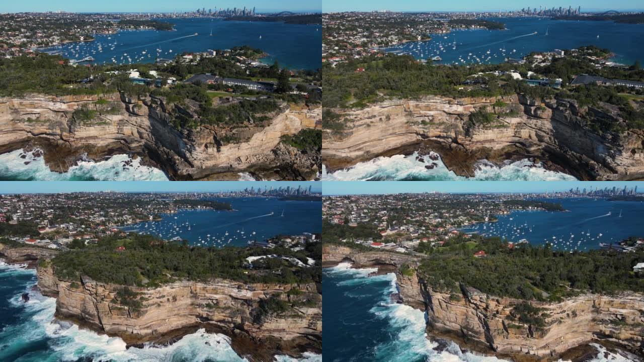 东悉尼屈臣氏湾的空中无人机视图，沿着悬崖顶向南行驶