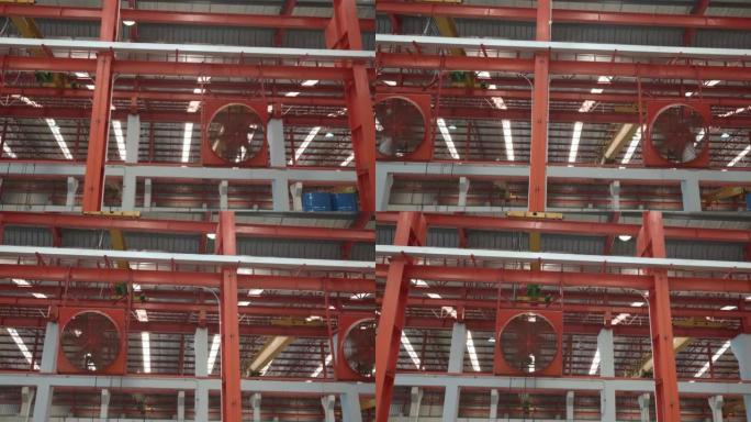 工厂中的大型工业冷却器红色风扇，用于减少运行中的热量