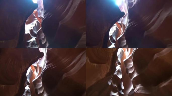 羚羊峡谷上的红色岩层运动，具有波浪形和光滑的砂岩壁。