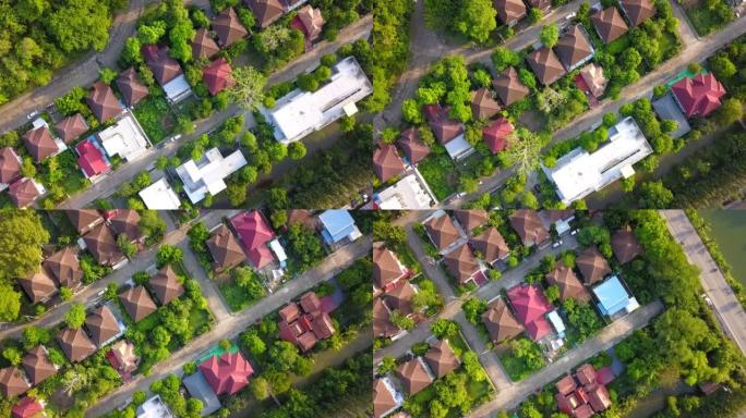 住宅项目顶视图的绿色环保环境包围的郊区无人机拍摄