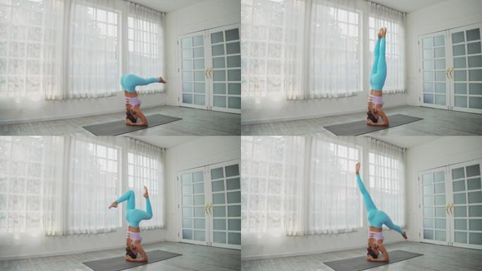 瑜伽专业知识，亚洲女性做倒立姿势