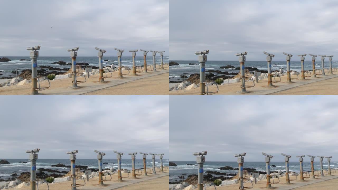 固定式双筒望远镜，望远镜，塔观看器，望远镜或瞄准镜，海洋海滩。