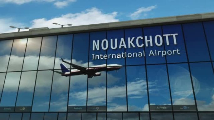 飞机降落在毛里塔尼亚努瓦克肖特机场，在航站楼中镜像