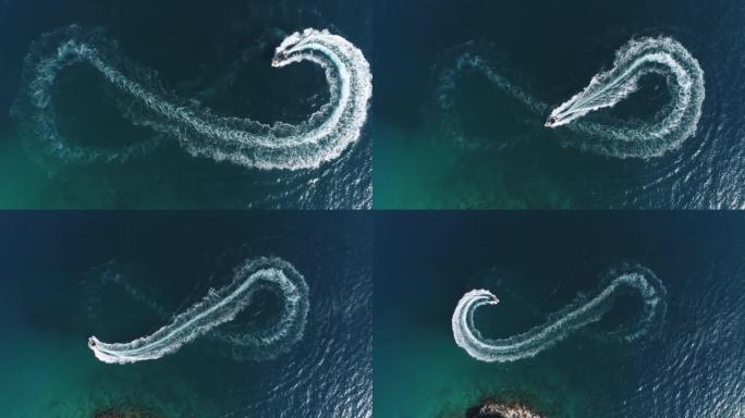 夏日白色游船的空中俯视图。海上摩托艇转弯八圈，使metaverse无限未来概念。