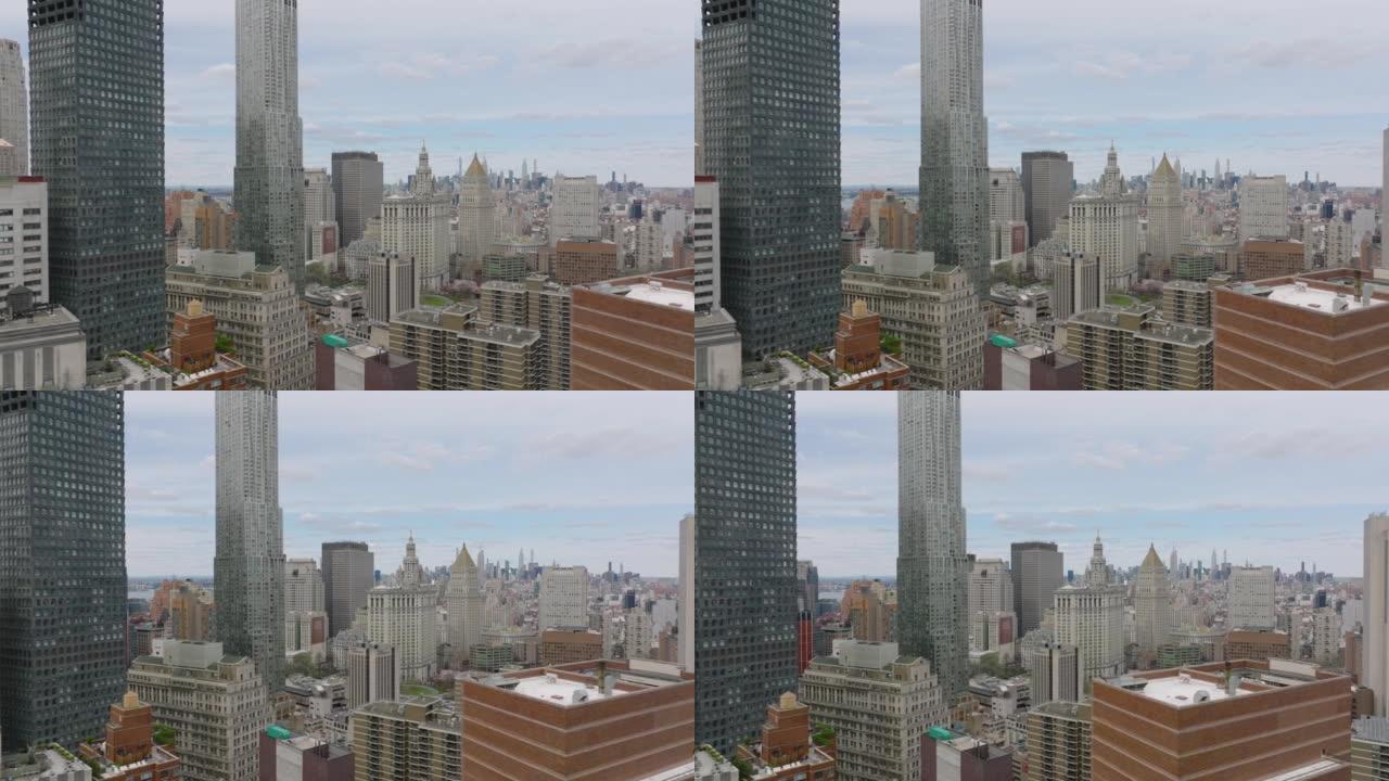 在城市上空飞行。市区高层建筑的高架镜头。视差效应。美国纽约市曼哈顿