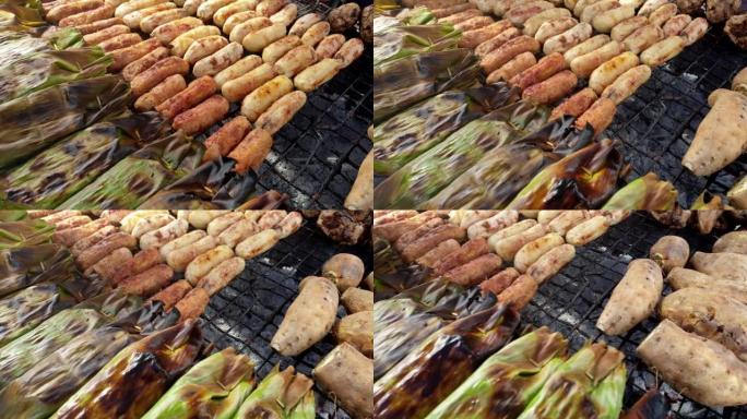 泰国当地街头食品木炭烤香蕉山药和香蕉叶包裹糯米