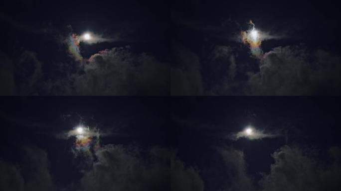 云在夜晚的月亮背景上移动