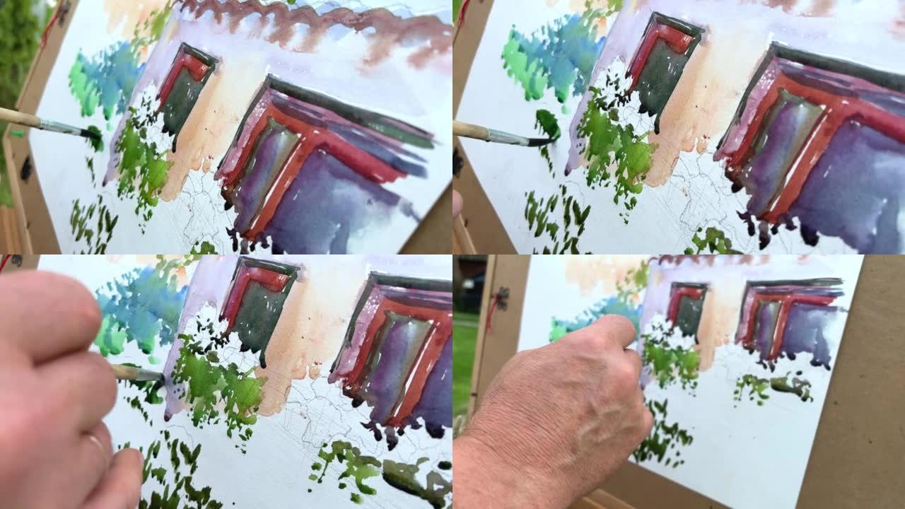 45-55岁的成年男性艺术家画了一幅画，看着他面前的房子，一张纸上，你已经可以看到窗户和绿色木材，以