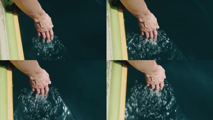 手触摸水。