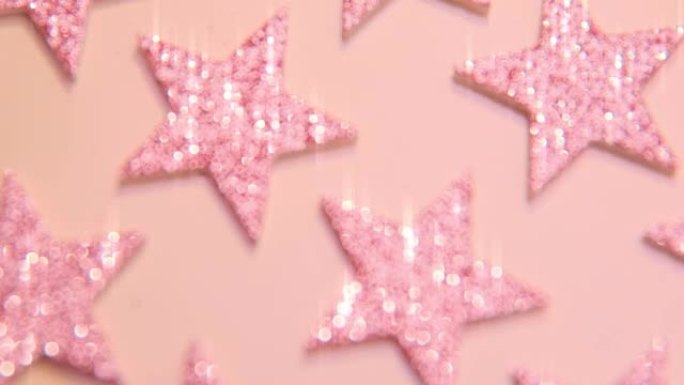 闪亮闪光粉色模糊星星发光背景。闪闪发亮的纹理。