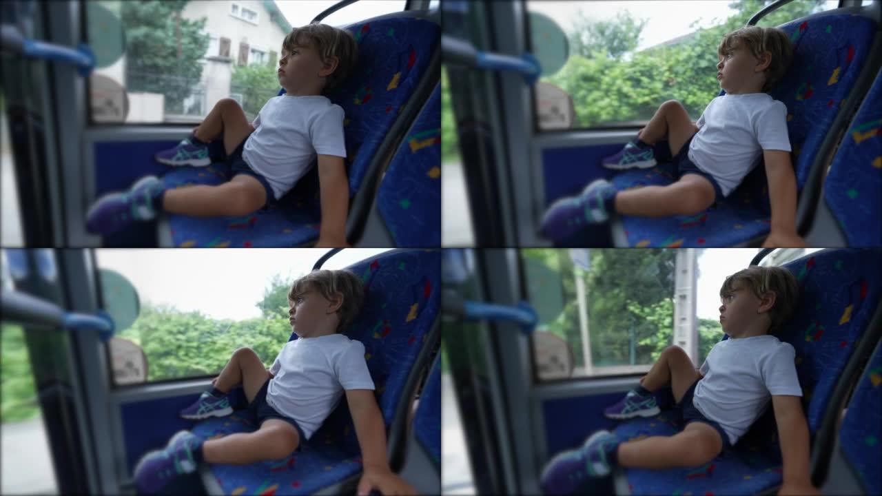 儿童乘公共汽车从窗外看