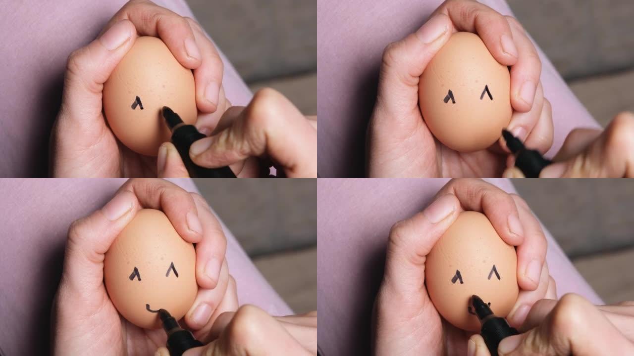 农民在鸡蛋上手绘笑脸。创意复活节概念。复活节的文化象征。有机农场鸡蛋，带有拉面