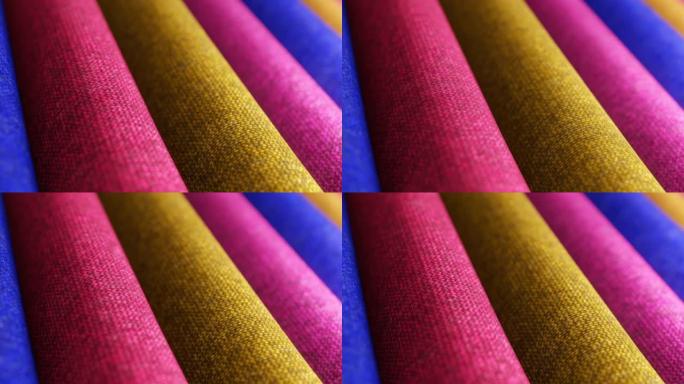 旋转面料材质鲜艳色彩抽象纺织时尚潮流设计背景3D视频循环