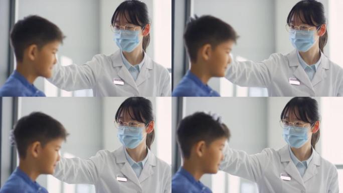 亚洲女医生支持生病的孩子