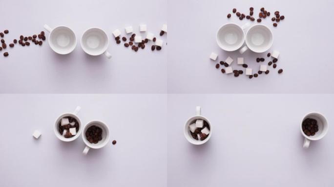 咖啡豆的停止运动动画，带有方糖和灰色背景上的咖啡杯。咖啡店的促销活动。顶视图