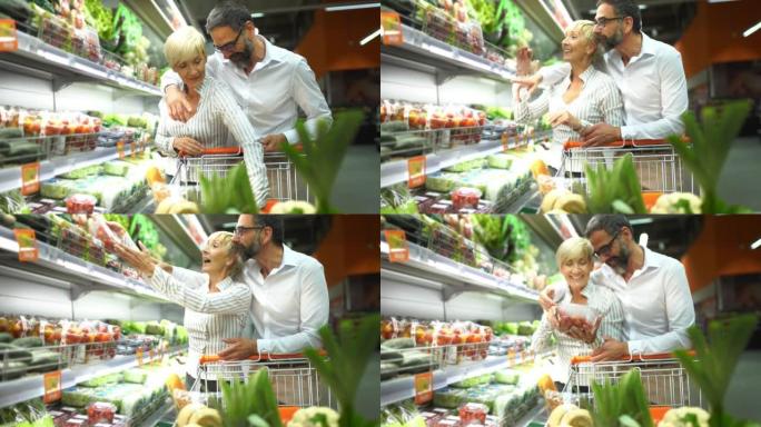 成熟的夫妇在超市购物。