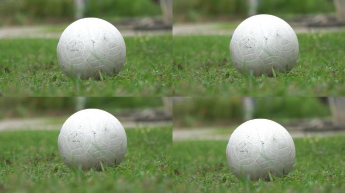 绿色球场上的足球