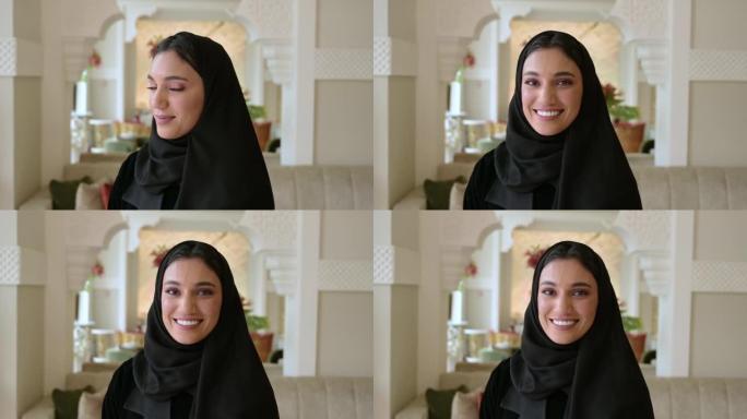 欢快的中东年轻女性的室内肖像