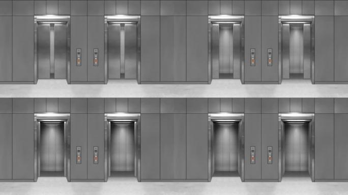滑动钢门电梯打开，显示电梯内部。灰色墙壁的办公楼