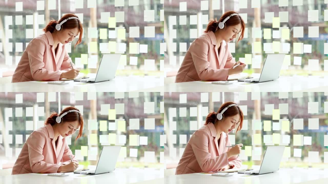 商业女性与商业伙伴通过笔记本电脑上的视频通话，她正在与一家联合创业公司的规划、运营和财务合作伙伴会面