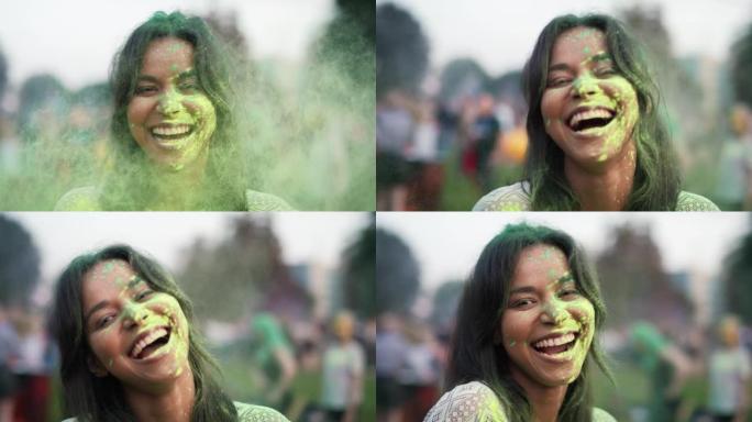 在洒红节上，多种族妇女看着相机的特写镜头。用8k的红氦相机拍摄。