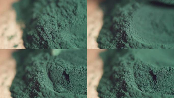螺旋藻粉特写。超级食品概念。微距摄影。选择性聚焦