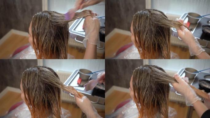 在理发店染发或以金色突出后进行头发调理。