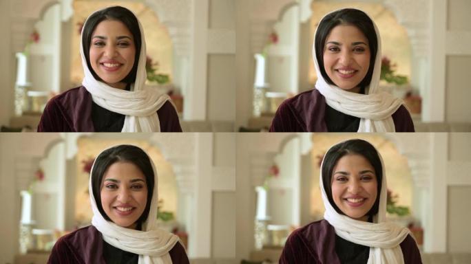 身着传统服装的年轻沙特女子特写