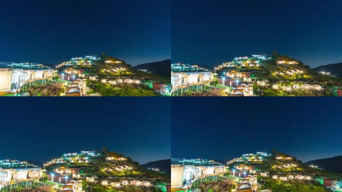 山顶上有星空的小村庄，山上七彩村的夜景，延时拍摄