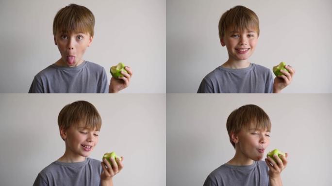 特写孩子的脸看着相机，露出舌头，咬青苹果