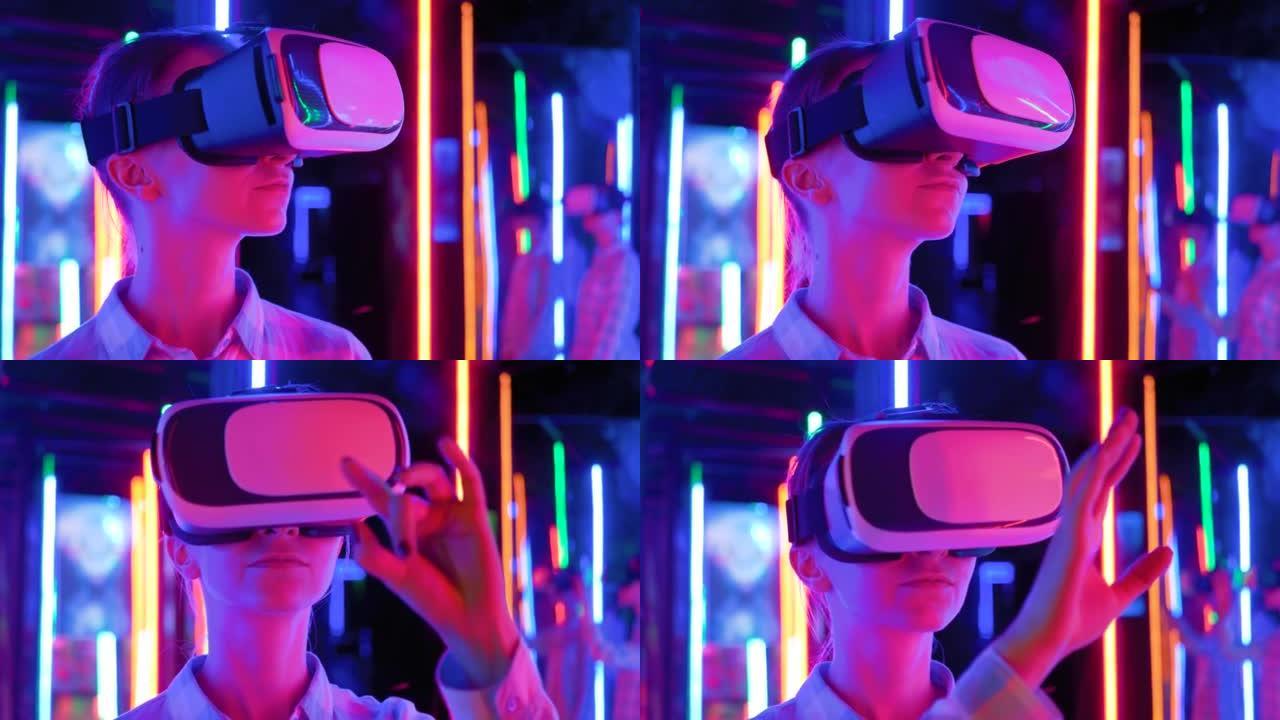 在互动VR展览会上使用虚拟现实耳机的女人