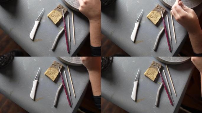 桌子上的陶器工匠工具