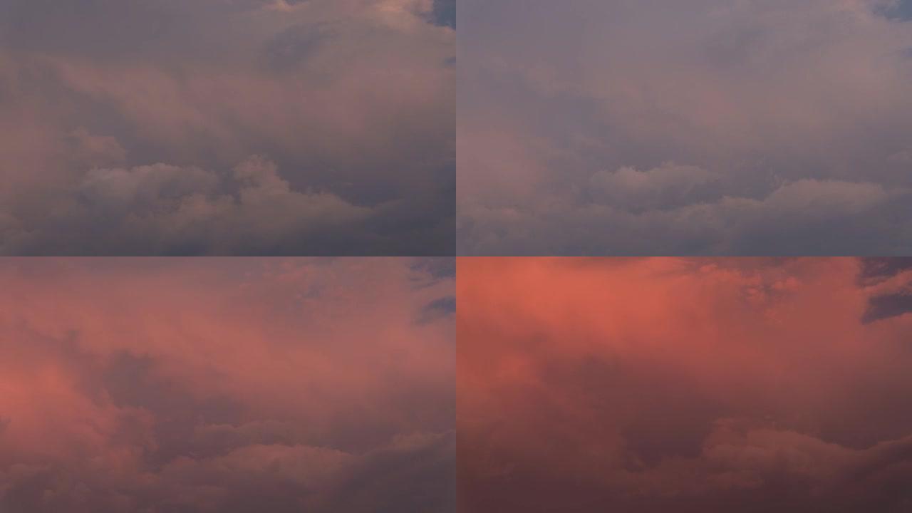 4k视频延时黄昏天空当日落时刻。美丽的云在黑暗来临之前移动和天空变色。